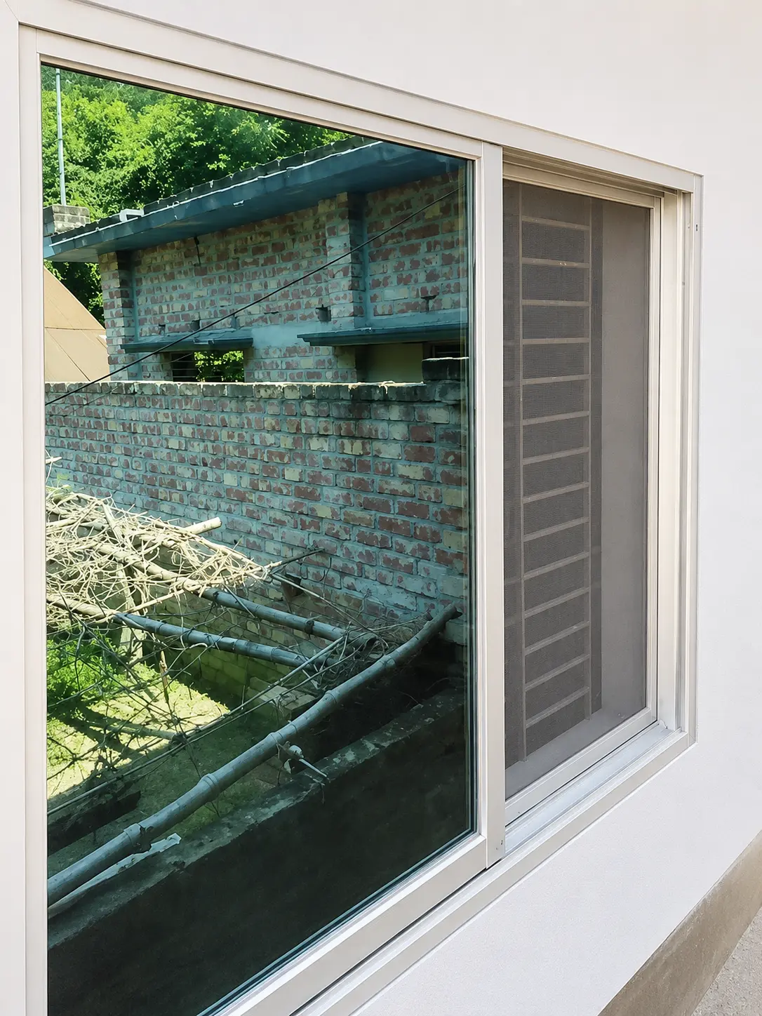 Aluminium sliding window and mosquito net work by City Mistri